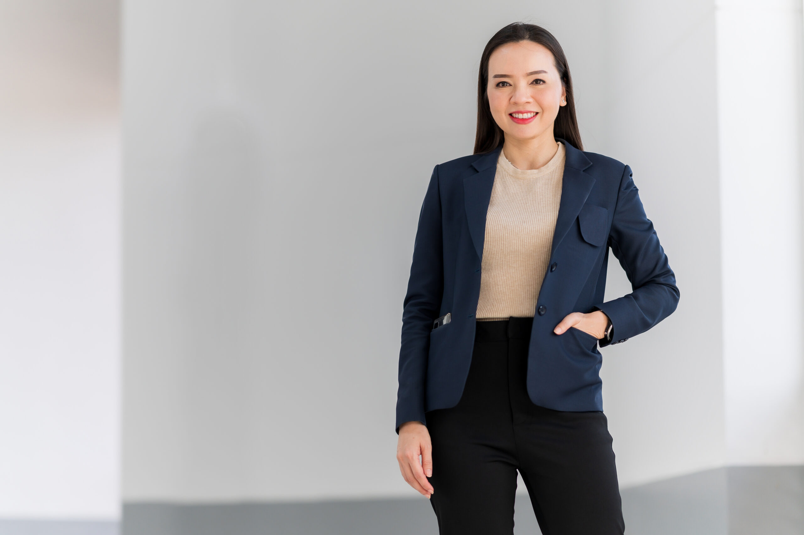 portrait of A middle-aged Asian working women looking at camera