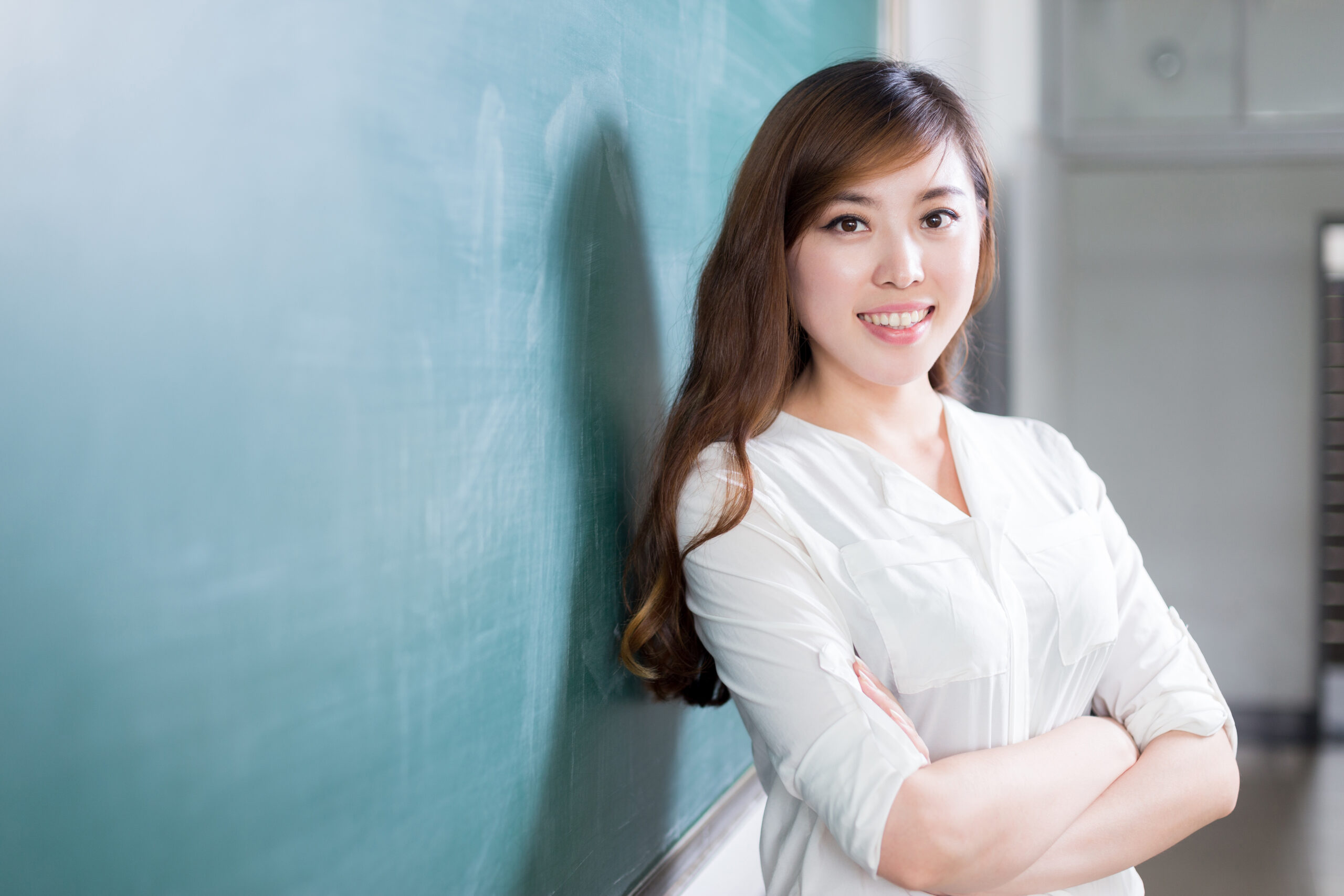 asian beautiful woman portrait infront of blackboard